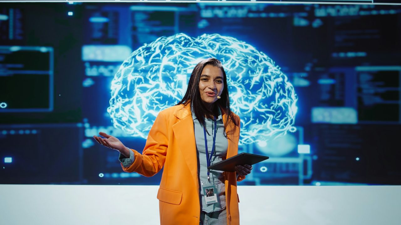 presenter promoting artificial intelligence business solutions.jpg
